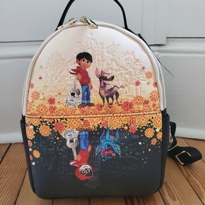 Disney loungefly new with tags Coco Pixar mirror backpack mini bag